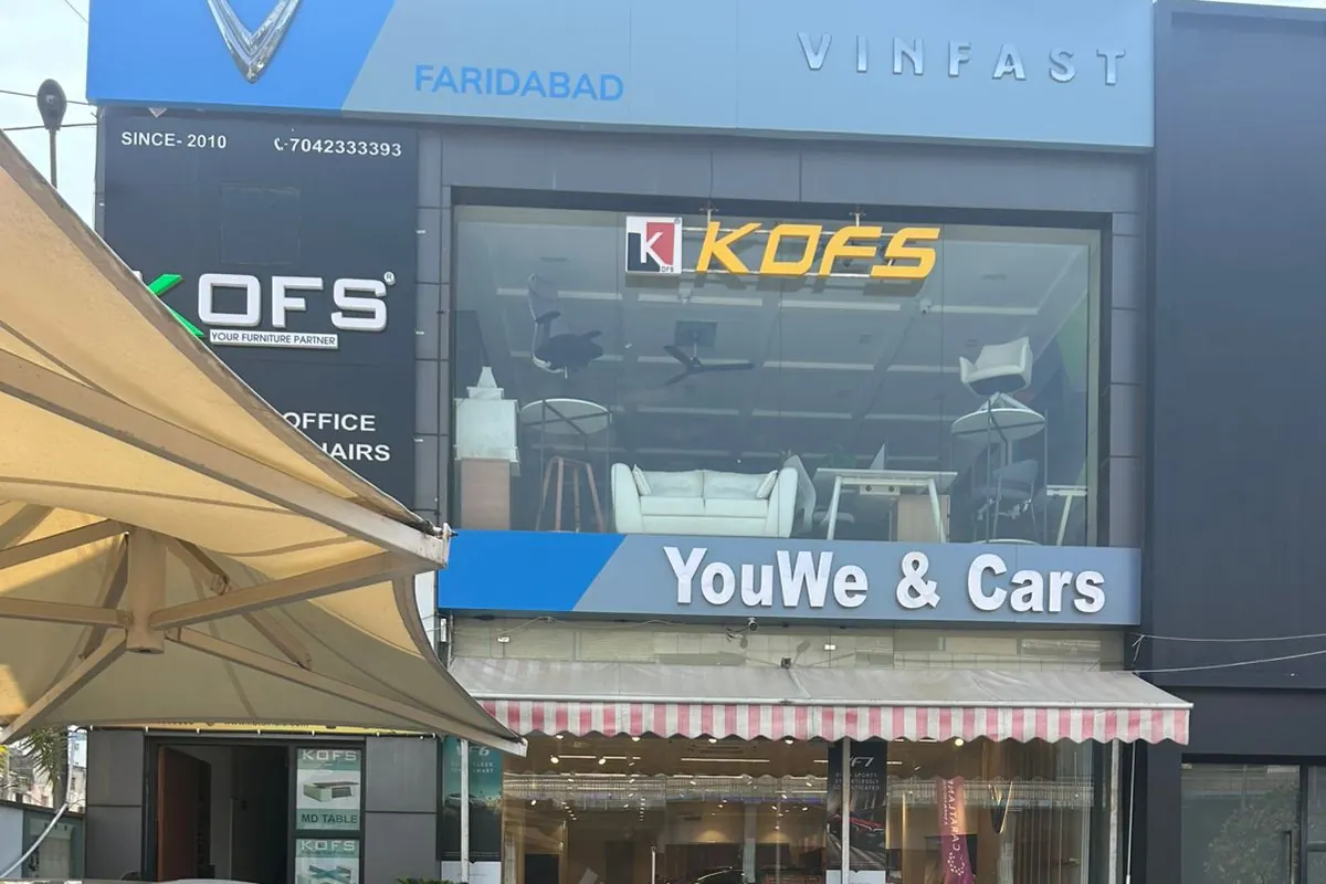 YouWe VinFast Faridabad showroom, with the VinFast Faridabad and YouWe & Cars signs