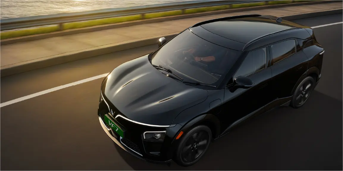 VinFast VF 7 in black on an open road