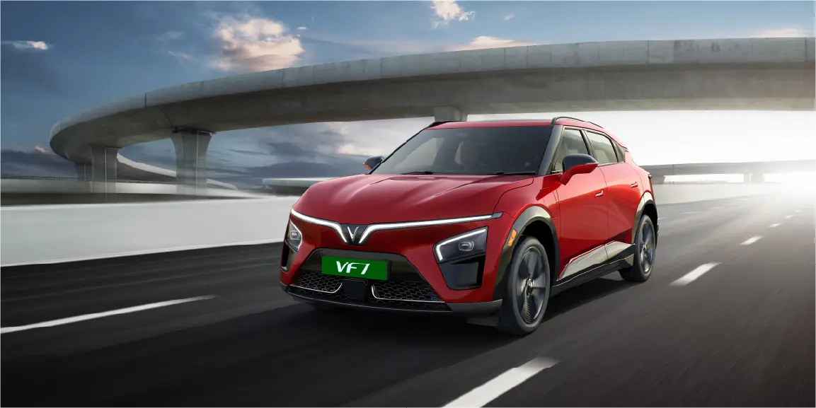 VinFast VF 7 in red on an expressway